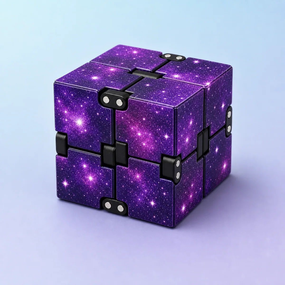 Infinity Flip Cube, Galaxy Purple shown on a soft pastel studio background