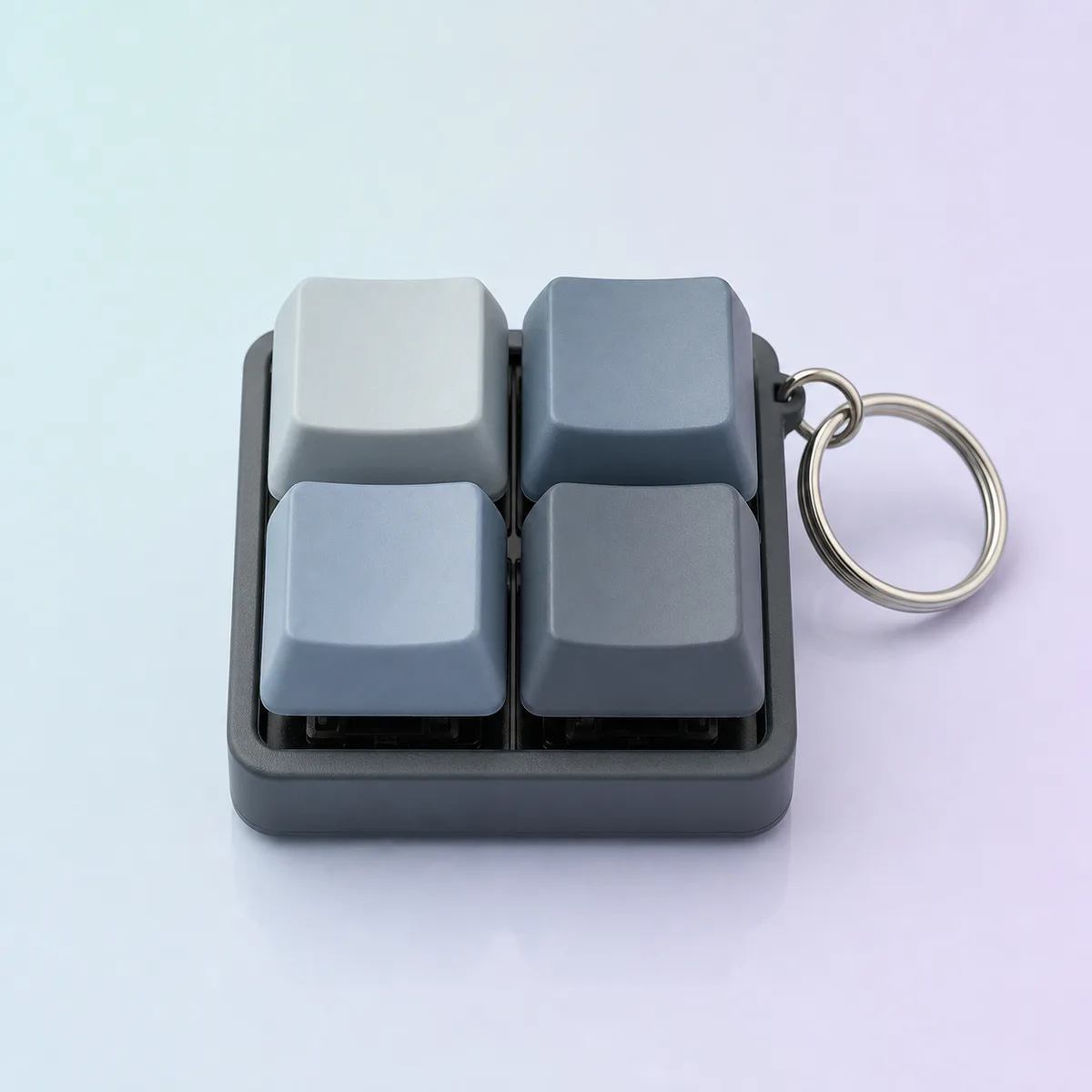 Clicky Keys Keyboard Fidget: four blank mechanical keys with a metal ring
